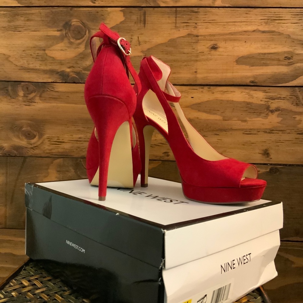 Nine West faux suede platform peep toe pumps.